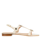 Italian-made women's flat cream leather sandal with gold accents, affordable luxury footwear for everyday elegance